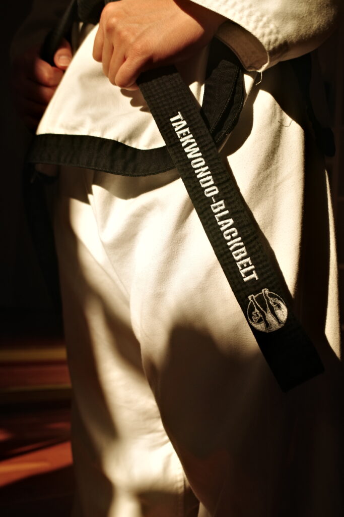 Schwarzer Gurt mit Aufschrift Taekwondo-Blackbelt